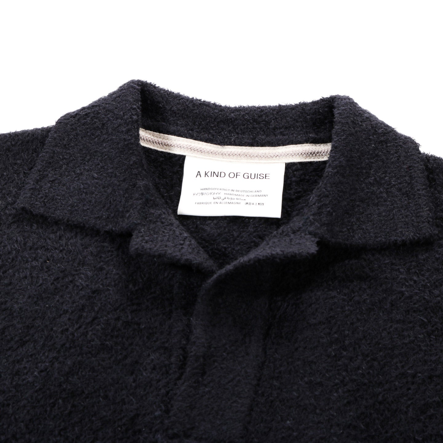 A KIND OF GUISE PIRRO KNIT POLO FRIZZY BLACK