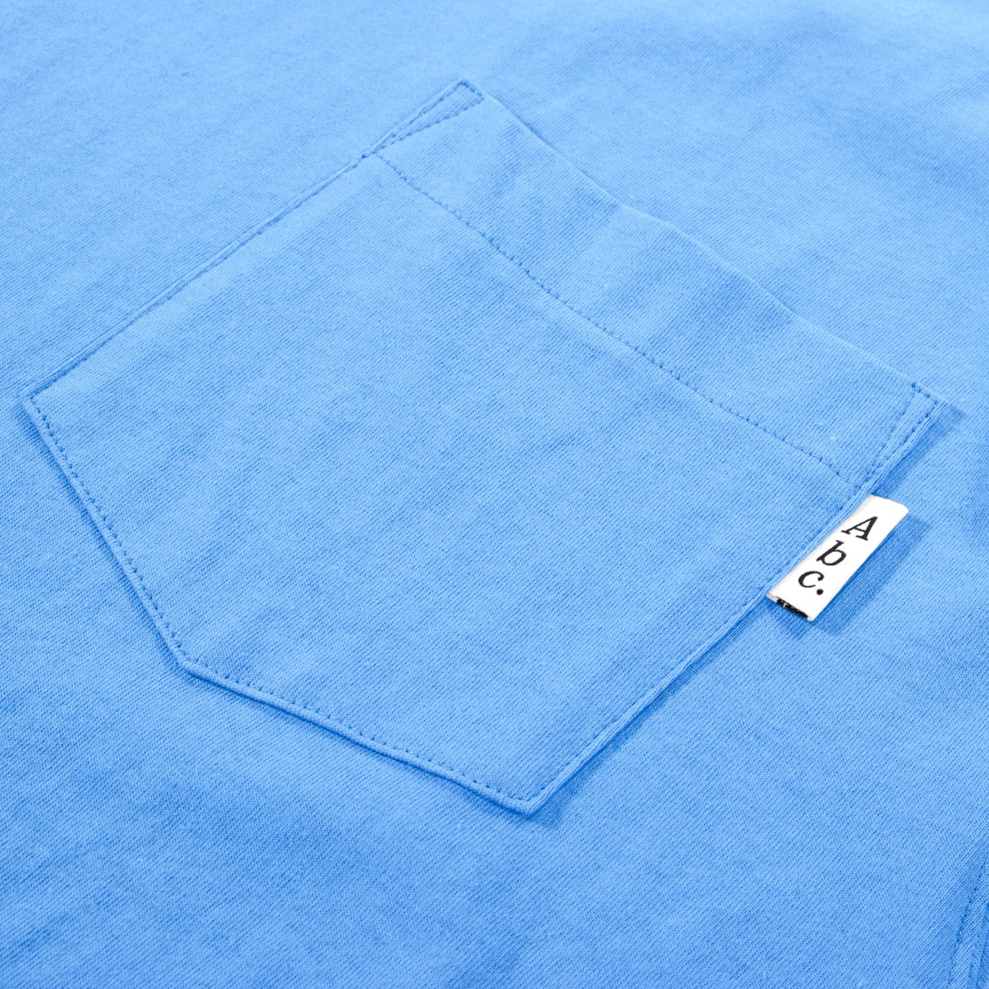 ABC. 123. LONG SLEEVE POCKET TEE CALCANTHITE