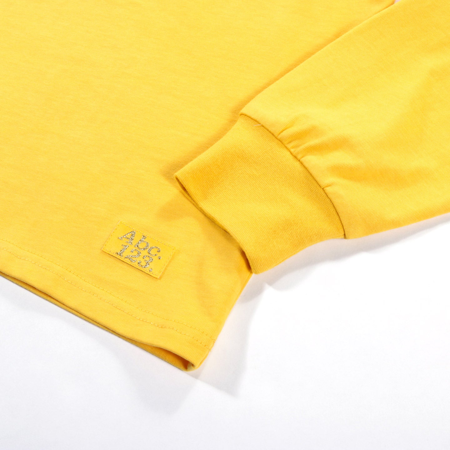 ABC. 123. LONG SLEEVE POCKET TEE SPHENE